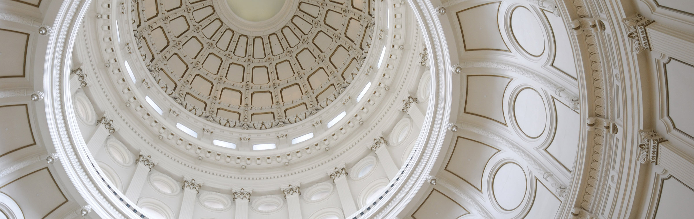 low-angle perspective of a white rotunda ceiling