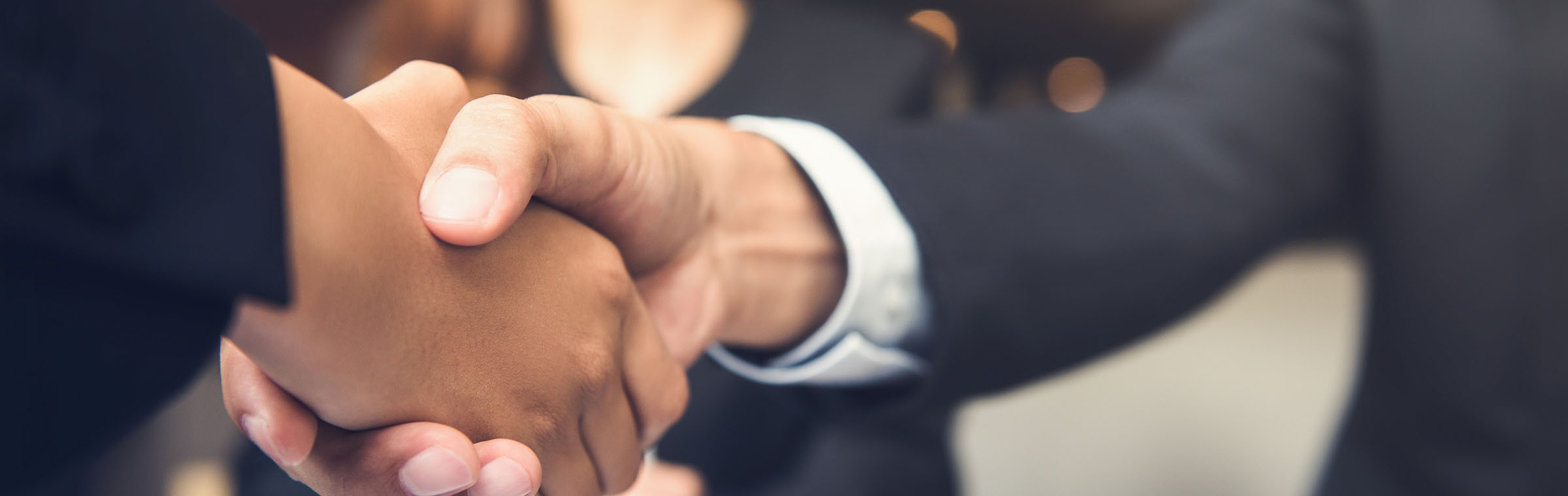 two people shaking hands