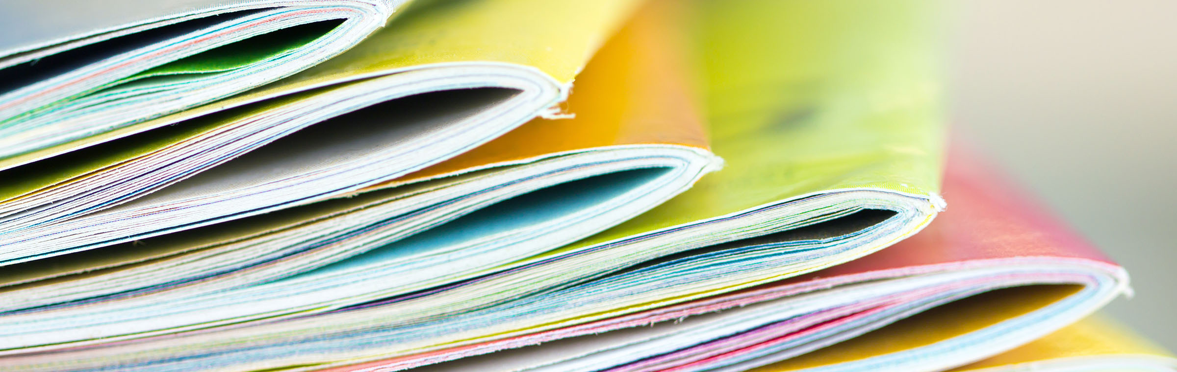 stacks of colorful booklets